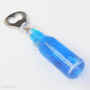 Blue clear bottle shaped beer opener