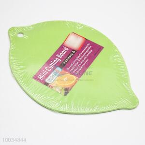 Plastic lemon shaped green cutting <em>board</em>