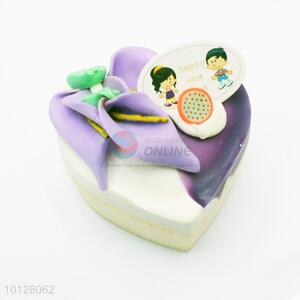 Purple heart shaped flower cake refrigerator magnet