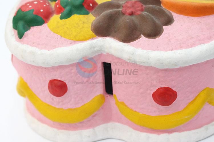 Popular low price daily use cake shape money box