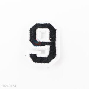 Popular cheap figure 9 shape embroidery badge brooch