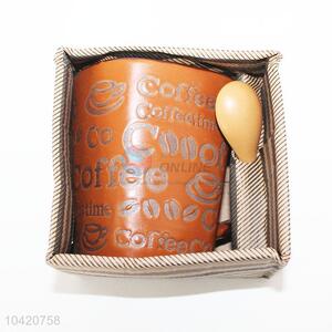 Good quality ceramic coffee cup with spoon