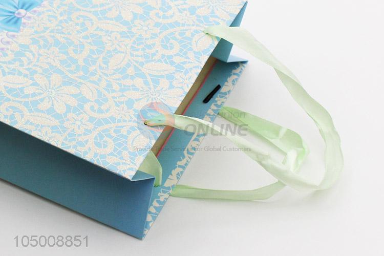 Customized wholesale recycled paper shopping gift bag with handle