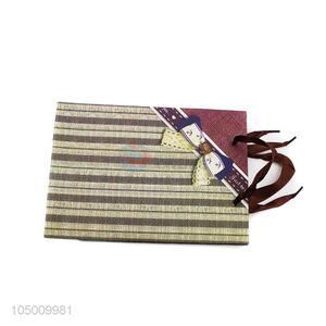 Wholesale cheap fashion printed paper gift bag with handle