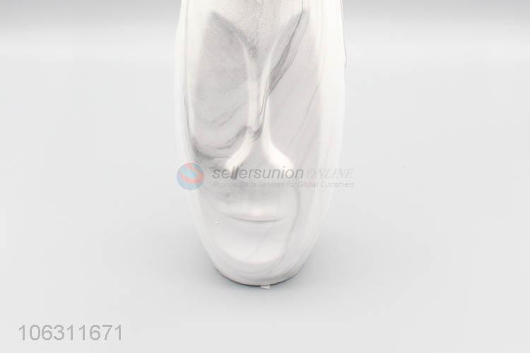 Factory direct supply decorative abstract human face ceramic vase