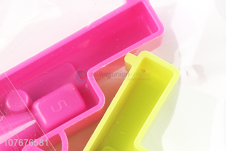 Most popular kids stationery gun shape plastic pencil sharpener