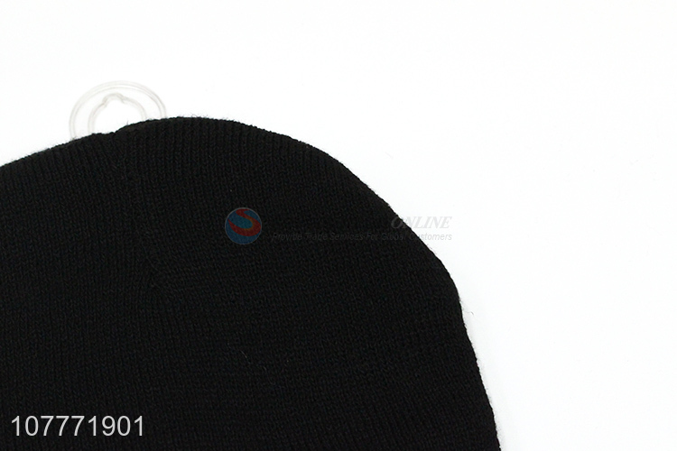 Wholesale plus velvet earmuffs solid color warm woolen hat cloth label knitted hat