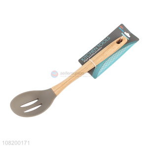 Factory price wooden handle slotted spoon kitchen utensil