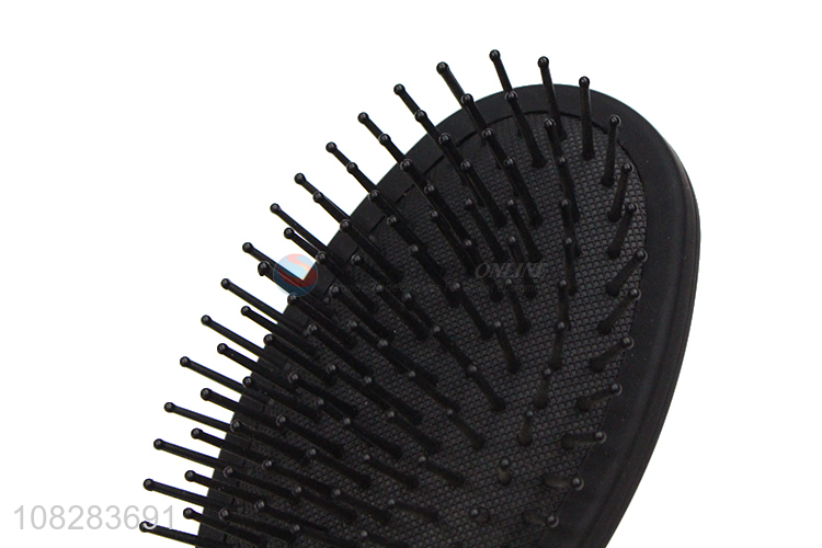 Low price black plastic massage roll hair comb brush for sale