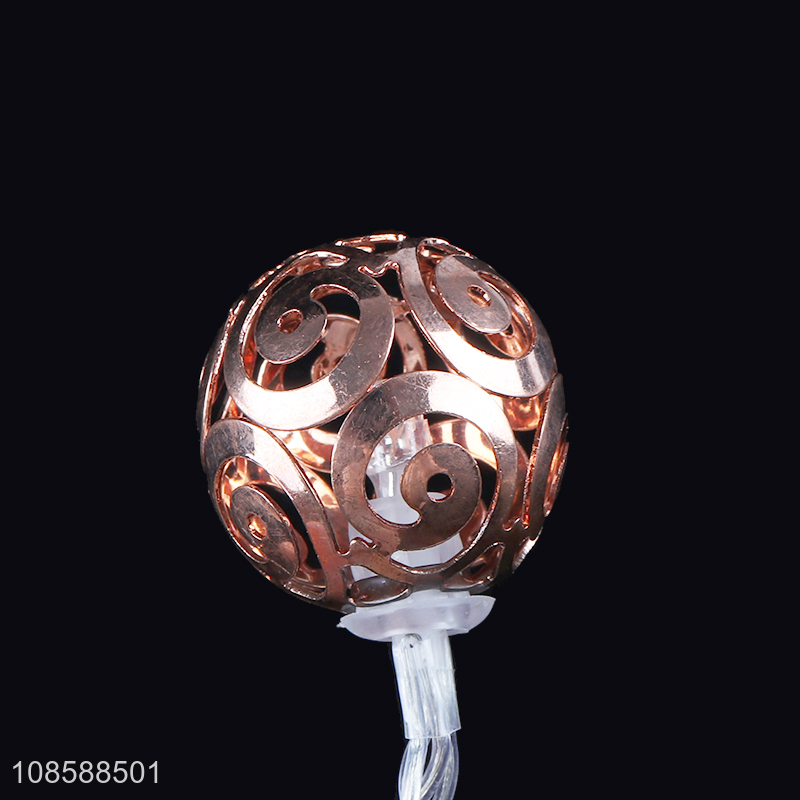 Wholesale AA battery operated rose gold hollowed-out metal ball led string light