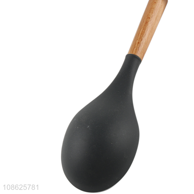 Good quality nylon basting spoon with wooden handle for cooking