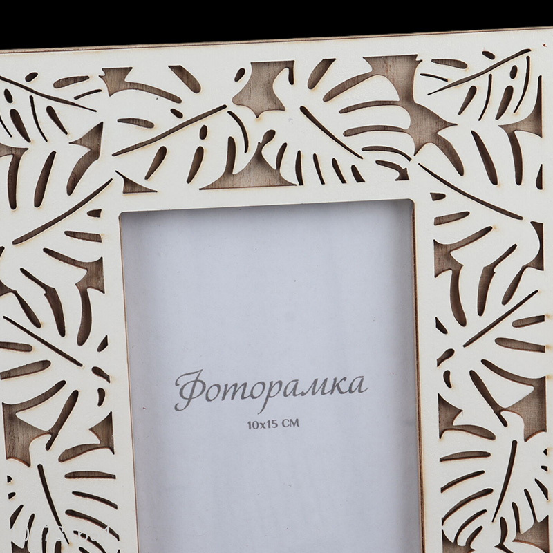 Wholesale hollowed-out engraved wooden standing photo frame for home decoration