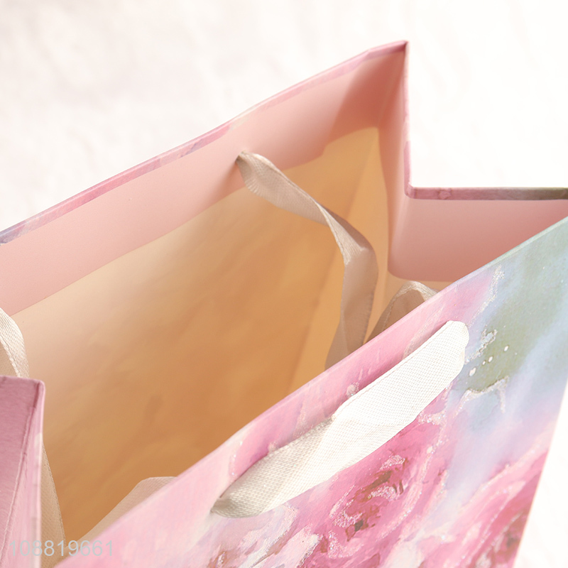 Good quality floral print paper gift bag with handles