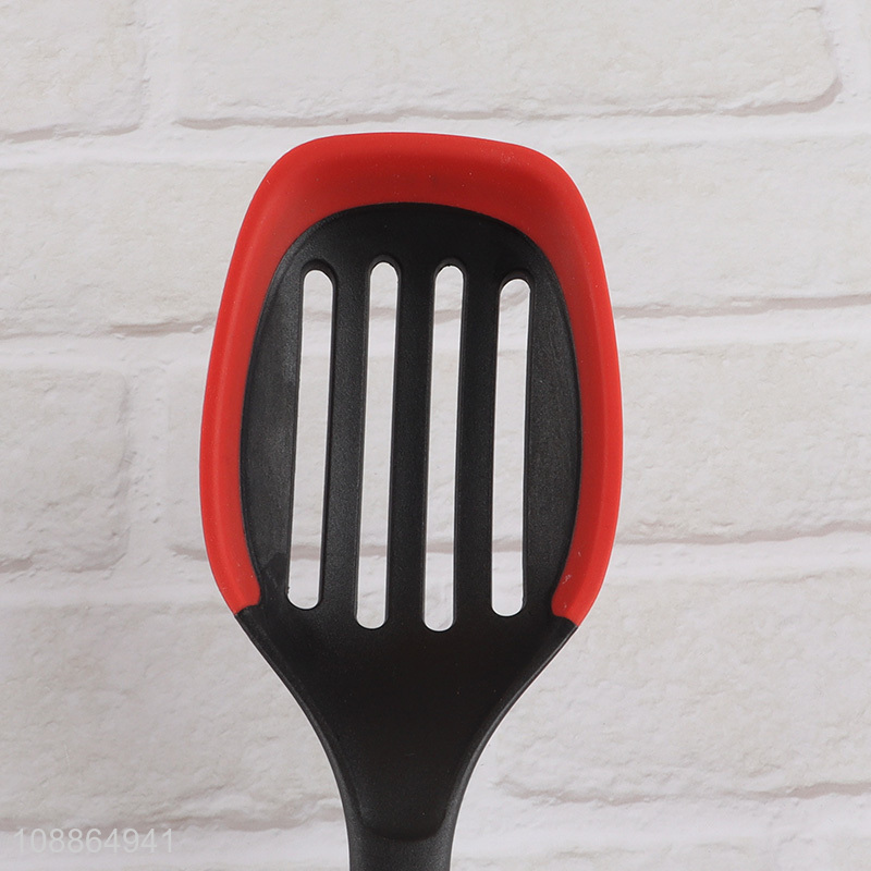 China imports slotted cooking spoon with silicone edge & plastic handle