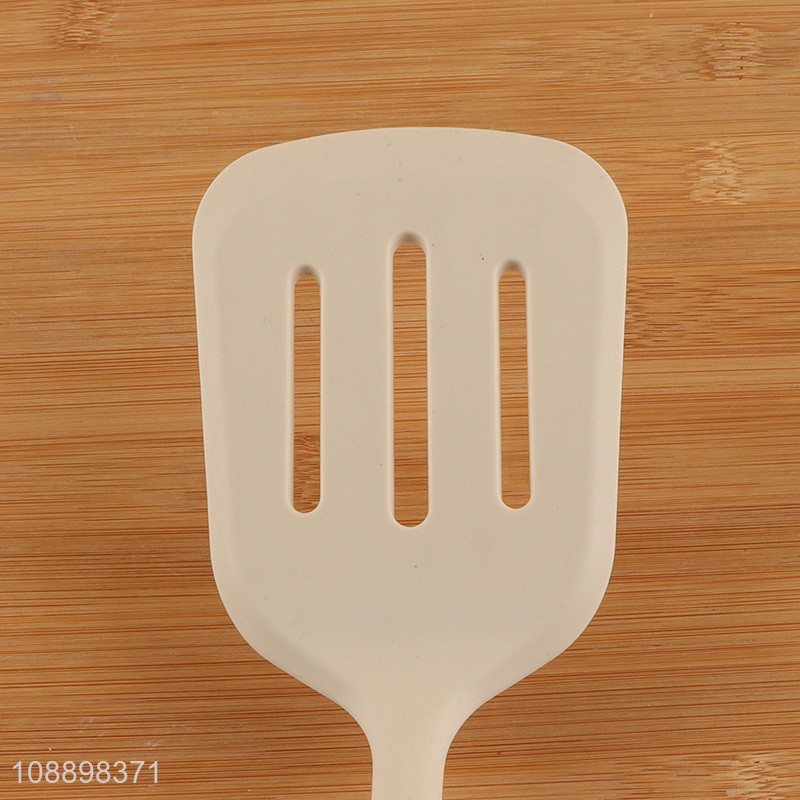 China factory stainless steel handle cooking slotted spatula