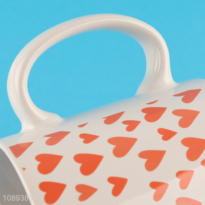 Popular products heart pattern ceramic water cup with handle