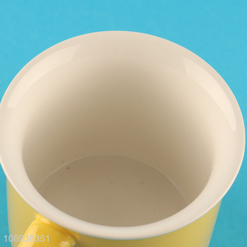 Low price yellow ceramic water cup water mug with handle