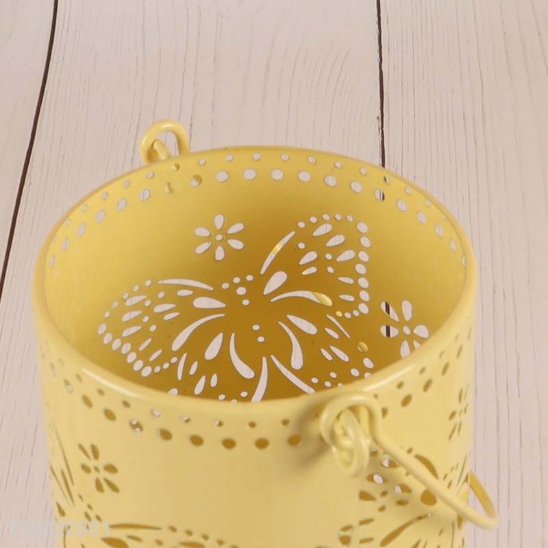 Best price yellow hanging hollow metal candle holder for home decoration