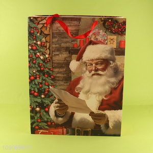 Top selling Claus Santa pattern eco-friendly gifts packaging <em>paper</em> <em>bag</em>