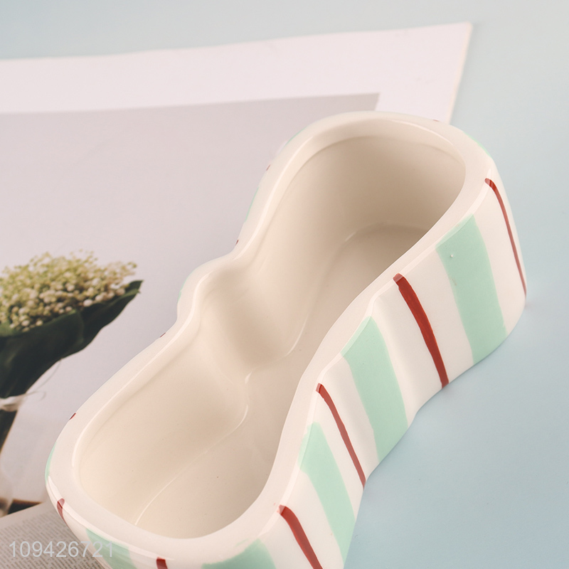Factory price bowknot shape ceramic storage jar
