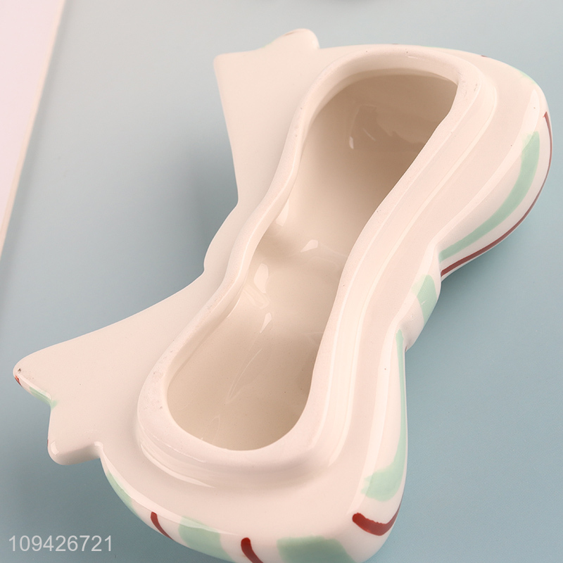 Factory price bowknot shape ceramic storage jar